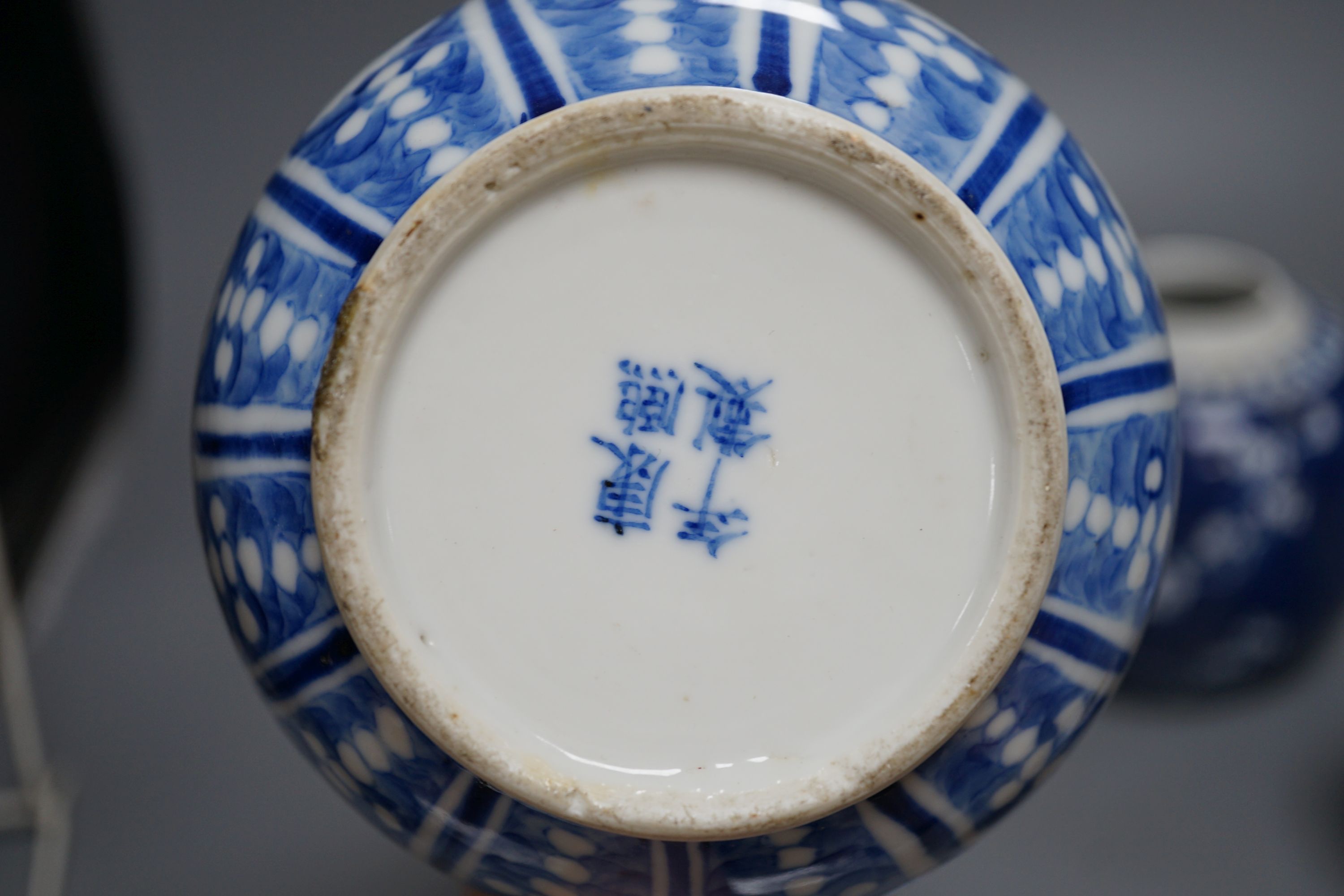 A Chinese blue and white vase and 3 graduated blue and white ginger jars, Vase25 cms high.